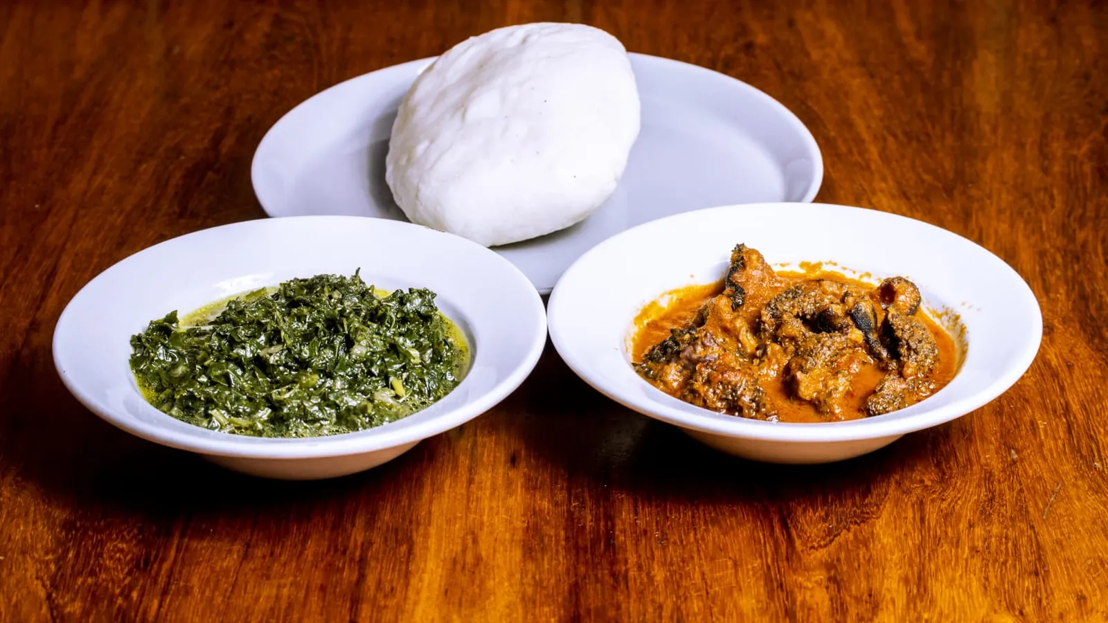 Pap, green vegetables and stew at Kamalo City Restaurant